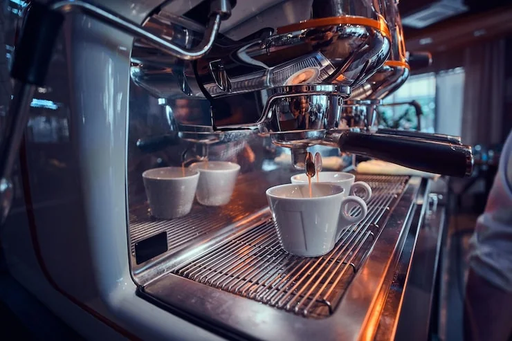 Collection of specialized tools and replacement parts for coffee machines